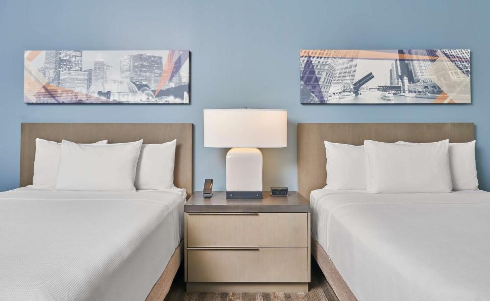 Den Guestroom with Two Queen Beds interior